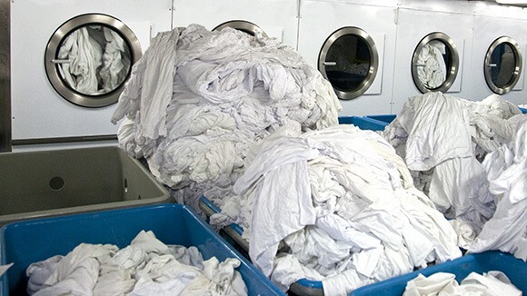 linen chute to laundry hopper washing machine room in california